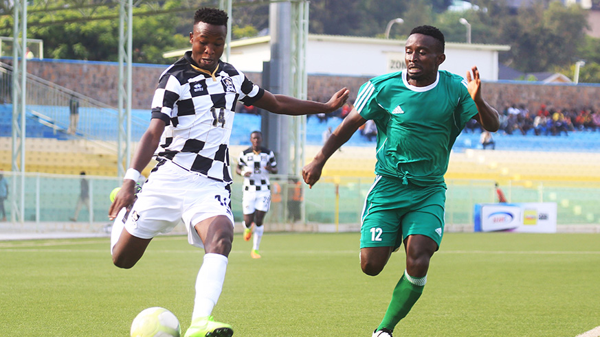 Forward Lague Byiringiro (L), seen here in action against SC Kiyovu, will lead APR attack against Police. Sam Ngendahimana.