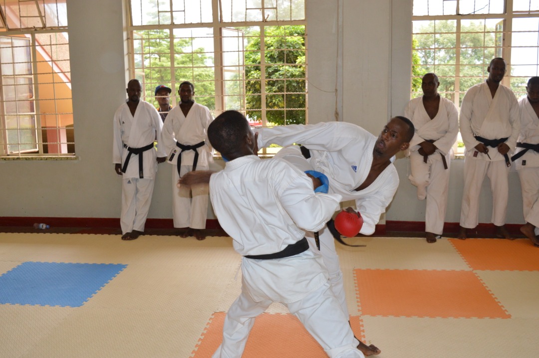 National team captain, Vanily Ngarambe, one of the few Lions Karate-Do School members on the national team is seen here tussling with a colleague during Sunday's training session. Courtesy