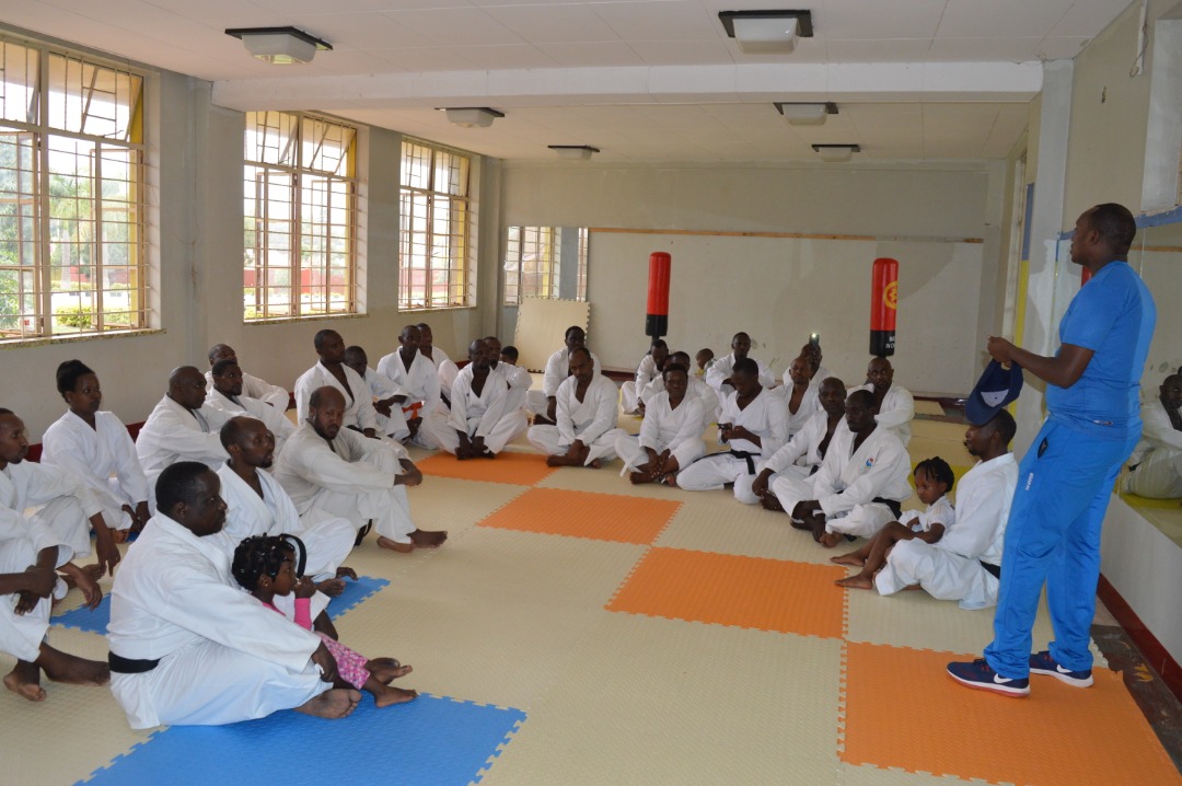 Ntigengwa addresses some members of Lions Karate-Do School on Sunday. Courtesy