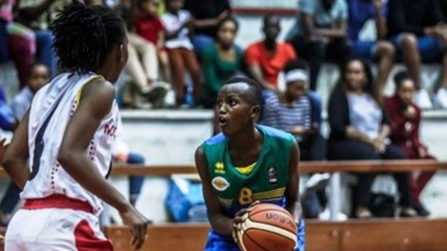 Joyeuse Sifa Ineza (with the ball) posted a game-high 20 points. Courtesy.