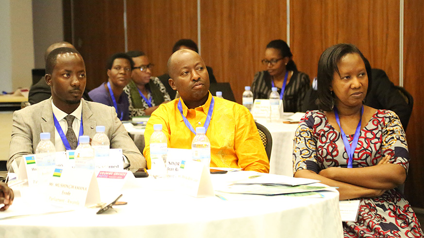 Members of the Chamber of Deputiesu2019  Public Accounts Committee (PAC), and Standing Committee on Budget and National Patrimony listen to Auditor General Obadiah Biraro (not in picture) during the latteru2019s presentation at the opening of a two-day training  workshop in Kigali yesterday. The legislators are training in how to better exercise oversight of governmentu2019s management and spending of public resources. Sam Ngendahimana.