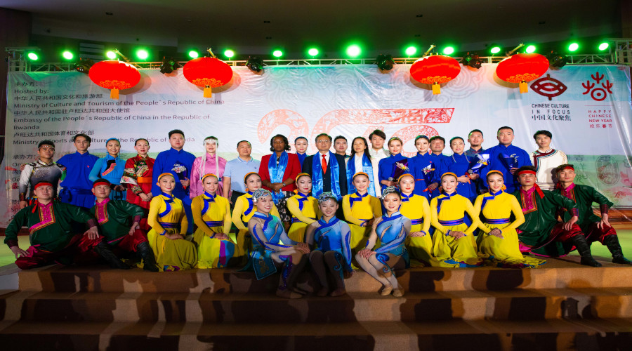 H.E. Ambassador of China to Rwanda RAO Hongwei, and the Minister for Sports and Culture, Nyirasafari Espeu0301rance, Performers and officials pose for a group picture after the celebrations. / Emmanuel Kwizera