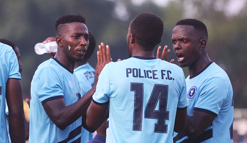 Police full-back Jean Marie Vianney Muvandimwe (L) rallies his teammates after conceding the second goal during their 3-2 win over Mukura at Kigali Stadium on Thursday. Sam Ngendahimana.