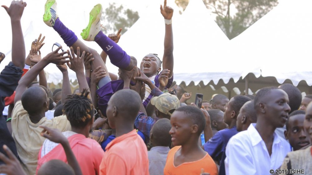 Samson Babua is lifted in the air by jubilant fans after inspiring Sunrise to their first victory over APR in four years. Igihe