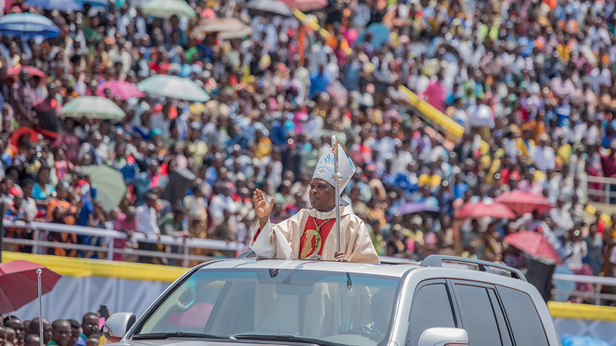  The new Archbishop greeting his flock at Amahoro National Stadium.