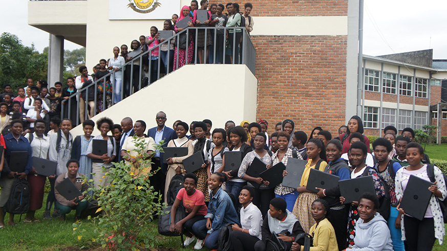 The recipients of the laptops in a group photo with officials at INES-Ruhengeri.  Ru00e9gis Umurengezi.