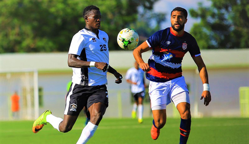 Fitina Ombolenga (L) is seen here in action during APR's CAF Champions League match against Club Africain of Tunisia at Kigali Stadium last November. File 