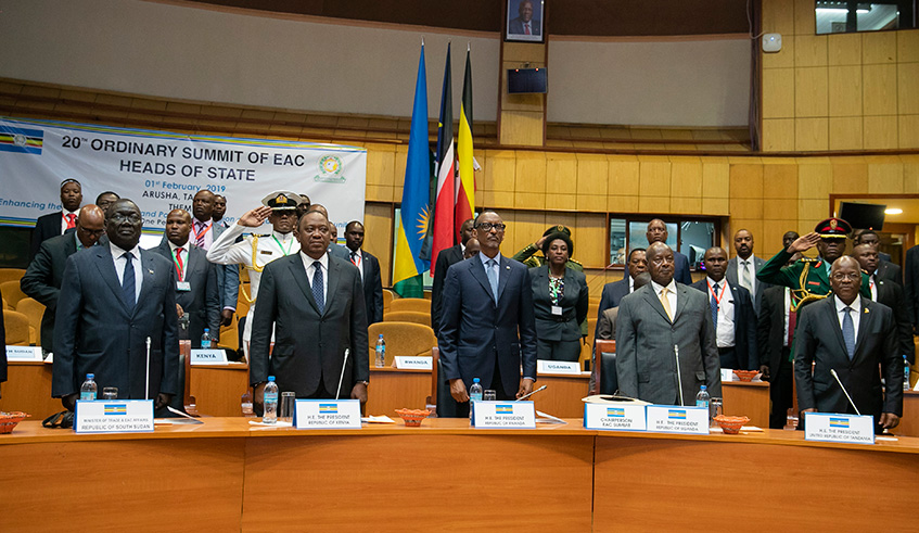 President Paul Kagame, EAC incoming Chairperson, flanked by President Uhuru Kenyatta of Kenya (left), outgoing Chairperson, President Yoweri Museveni of Uganda (2nd right) and host John Magufuli, President of Tanzania, during the 20th Ordinary Summit of the East African Community Heads of State in Arusha yesterday. Kagame called on regional leaders to ensure that the bloc works as it should in order to improve the lives of citizens.Village Urugwiro.