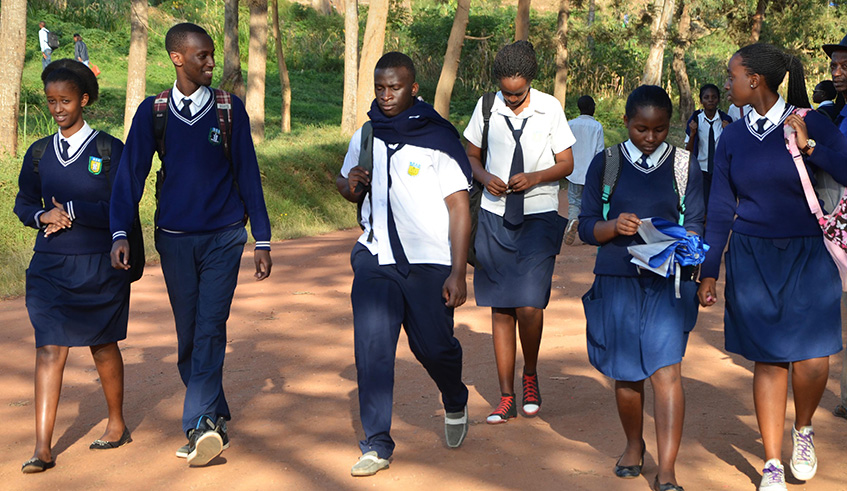 Students walk from school in Kigali. The Ministry of Education has signalled a plan to change school calendar. Sam Ngendahimana