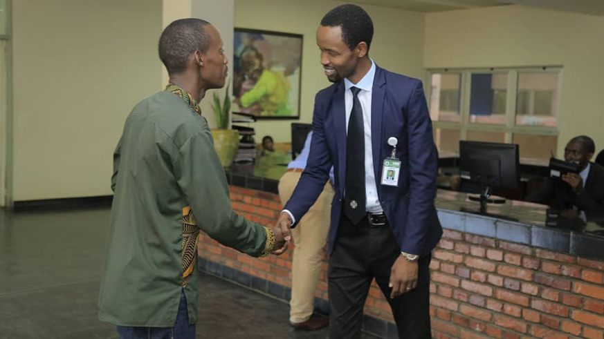 Bangumukunzi (R) says what makes customer care tick is the ability to listen to patientsu2019 needs attentively /Courtesy Photo