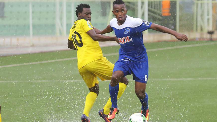 Kevin Muhire (with the ball) was instrumental in Rayon Sportsu2019 impressive campaign in the CAF Confederation Cup last year. File.