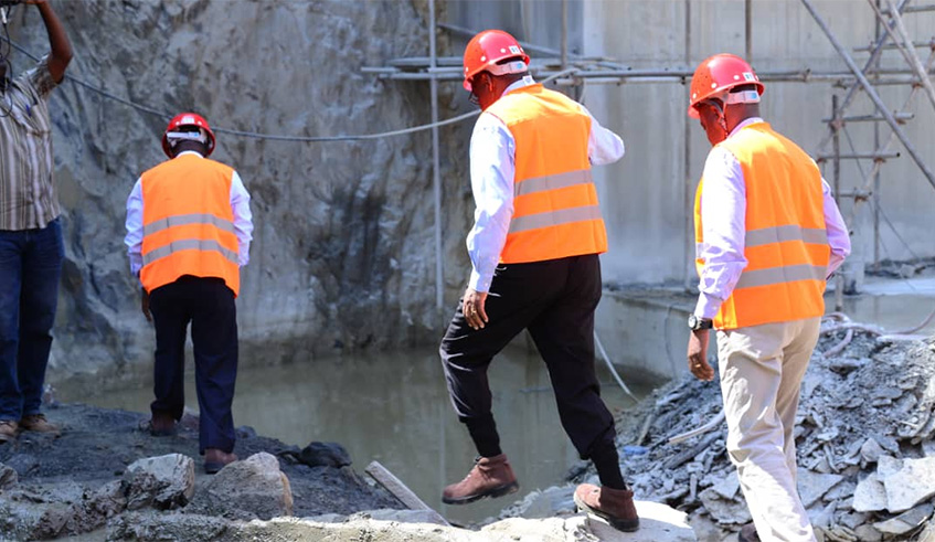 Officers inspecting construction of Rusumo power plant recently.Courtesy.