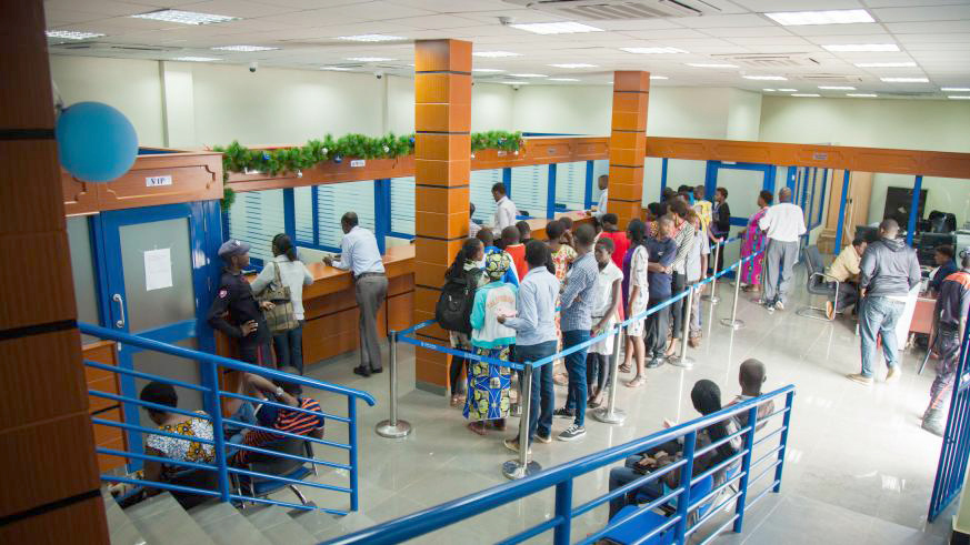 People on queue in a bank in Kigali. File.
