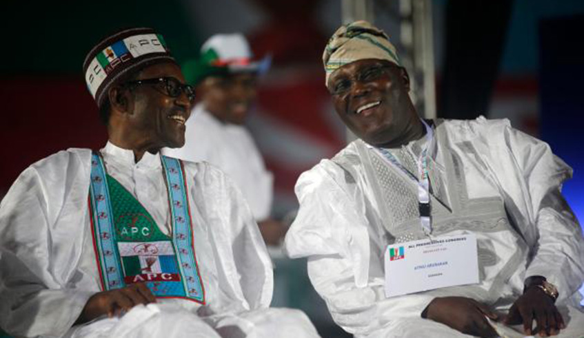 President Buhari (left) with Atiku Abubakar, the former vice president who is now the leading opposition challenger. Net photo.