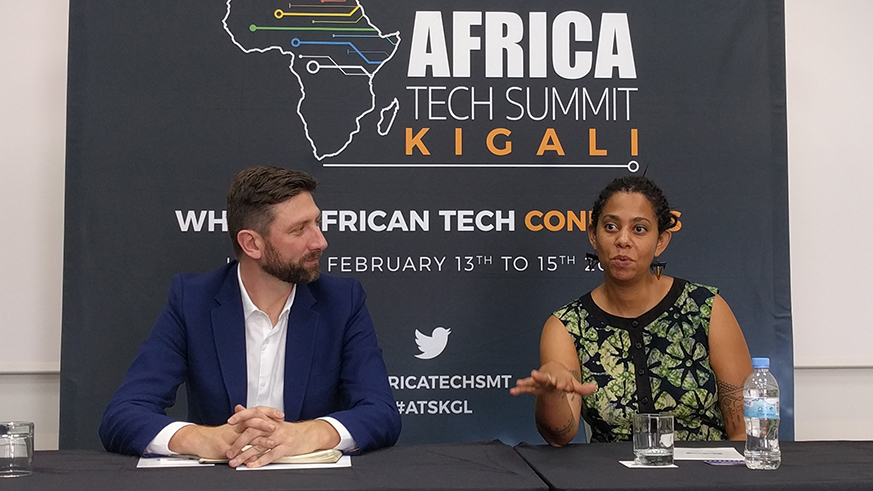 Andrew Fassnidge, founder of Africa Tech Summit Kigali, and Kantarama Gahigiri (right), film director and creative curator of Africa Tech Summit, speaking at a news conference on Feb.8, in Kigali.Courtesy. 