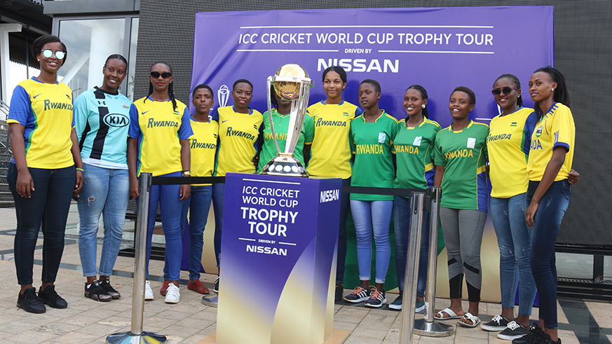 The national women cricket team took pose for a group photo with the ICC World cricket cup trophy yesterday. Courtesy.