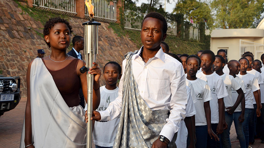 Youth hold a light of Hope during a previous commemoration of the Genocide Against the Tutsi. Sam Ngendahimana.