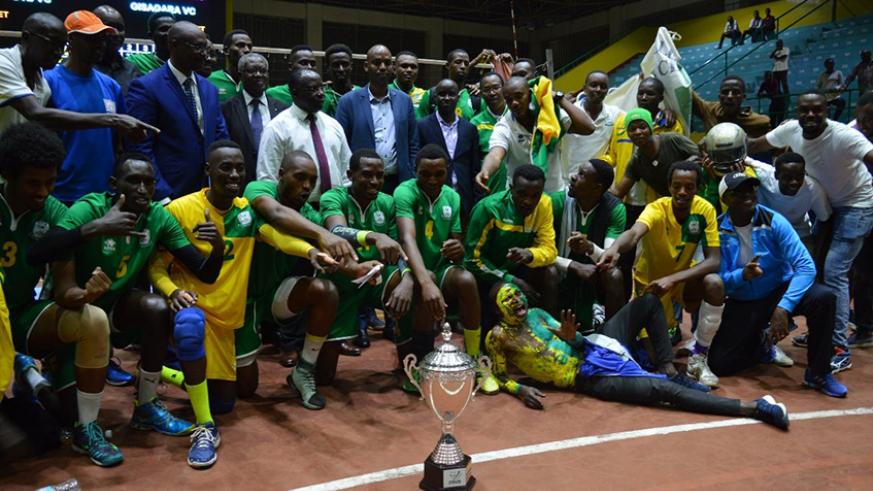 UTB players and staff celebrate with the trophy after beating Gisagara to win this year's Heroes Cup at Amahoro Stadium. (File)