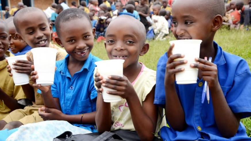 Children enjoy milk at school. (File)