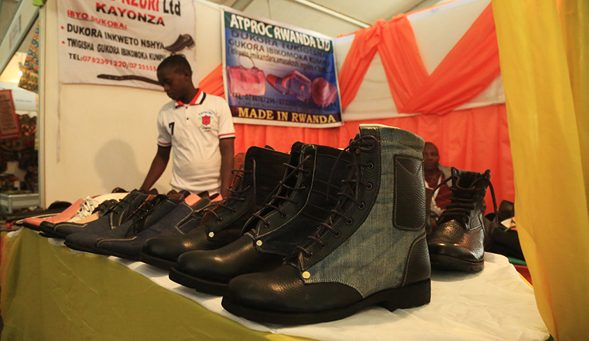 Kiato Nzuriu2019s shoes are showcased in Made-in-Rwanda expo at Gikondo expo ground. Sam Ngendahimana.