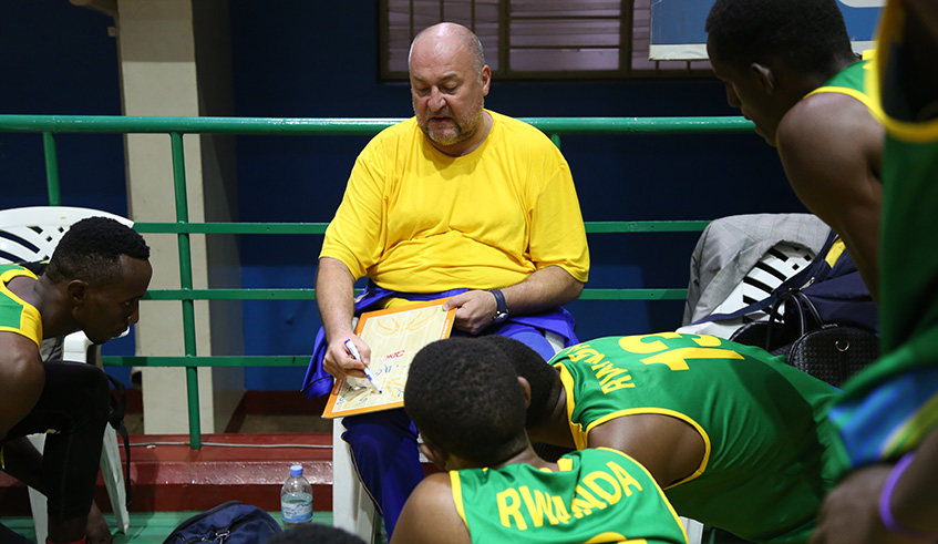 Coach Vladimir Bosnjak gives instructions to his players during a past match. Sam Ngendahimana.