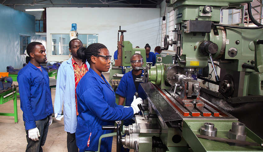 Marie Mukahirwa, a student at IPRC-Kigali, operates a machine in one of the workshops at Kicukiro campus. File.