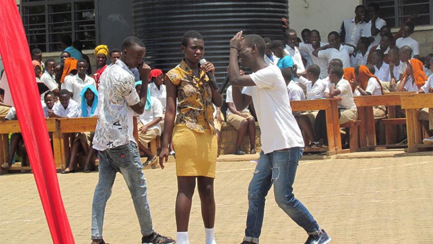 Students of GS Remera Protestant School perform the play about evils of unwanted pregnancies among the teenage students. / Francis Byaruhanga