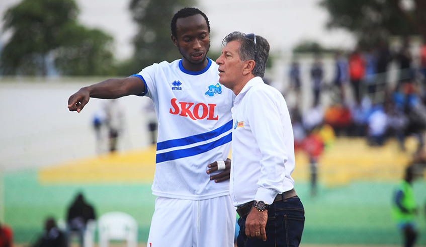 Roberto Oliveira Goncalves do Carmo  chats with skipper Thierry Manzi during a past match. Sam Ngendahimana.