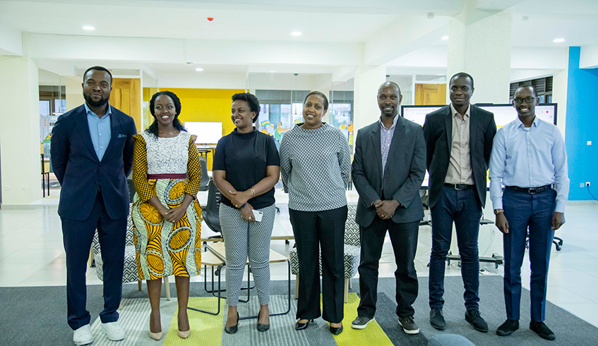 Rwandau2019s Minister for ICT and Innovation, Paula Ingabire (2nd left) with Techprenuer Bosun Tijani (L) and other officials pose after the official opening of CcHUB Design Lab. Photos by Emmanuel Kwizera.