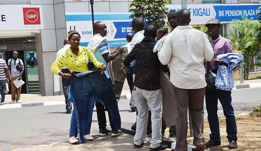 Street vendors in downtown Kigali. Two years ago, City officials issued stringent regulations that were meant to curb street vending. Sam Ngendahimana.