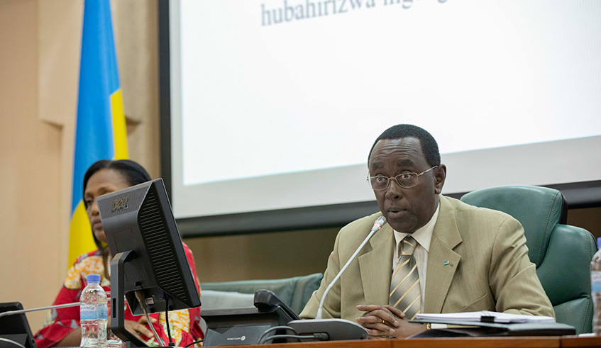 Senate president Bernard Makuza speaks during a session as Senate vice-president in charge of Administration and Finance Jeanne du2019Arc Gakuba looks on yesterday. Senators expressed concern over the uncoordinated land allocations which they said could cause losses to government in the future.  Emmanuel Kwizera.