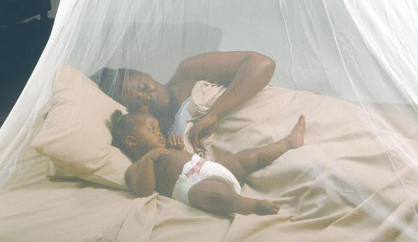 A mother and her child under a mosquito net. Rwanda spends a staggering $17 million (about Rwf15 billion) every year on importing mosquito nets. File.