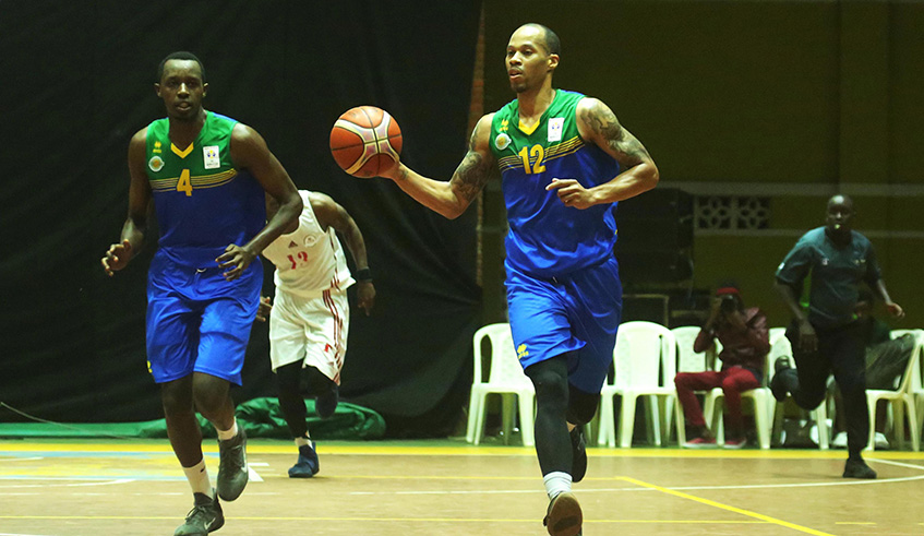 Point-guard Kenneth Gasana with the ball during a friendly match. Sam Ngendahimana.