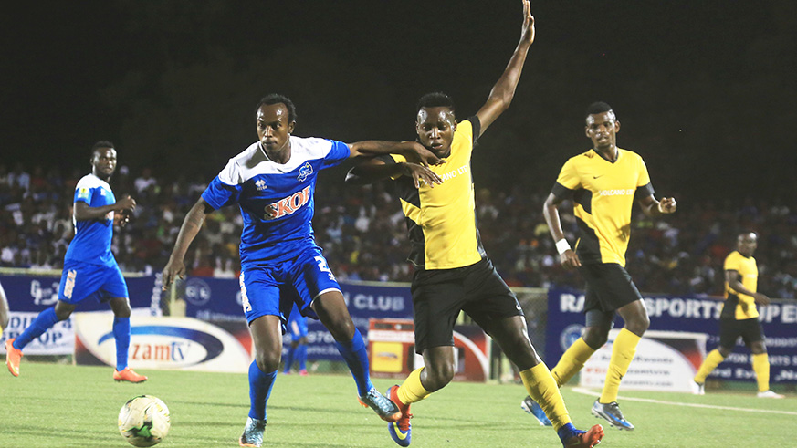 Rayon Sports midfielder Olivier u2018Sefuu2019 Niyonzima protects the ball against Mukura striker Rashid Mutebi during the 2018 Peace Cup final at Kigali Stadium last August. Sam Ngendahimana.