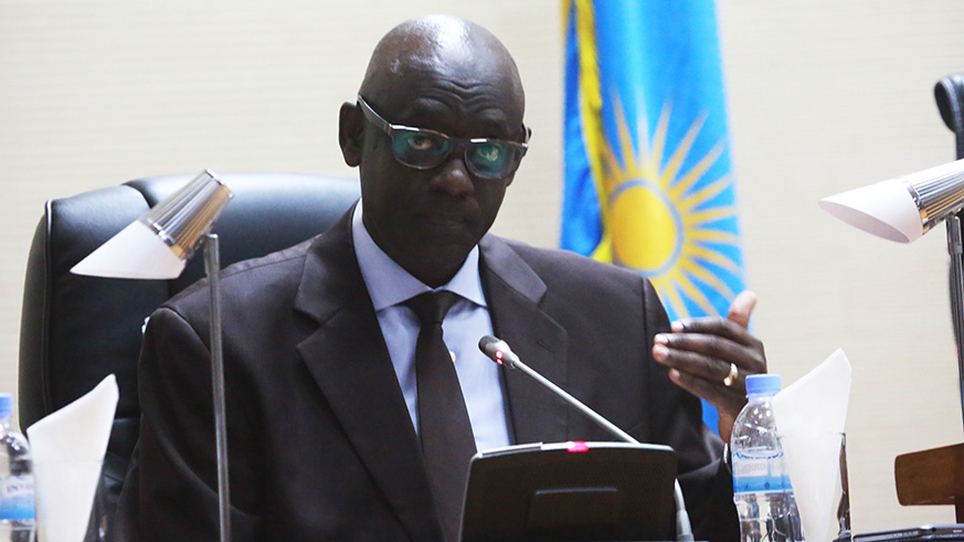 Minister Busingye addresses members of parliament last week. Sam Ngendahimana.
