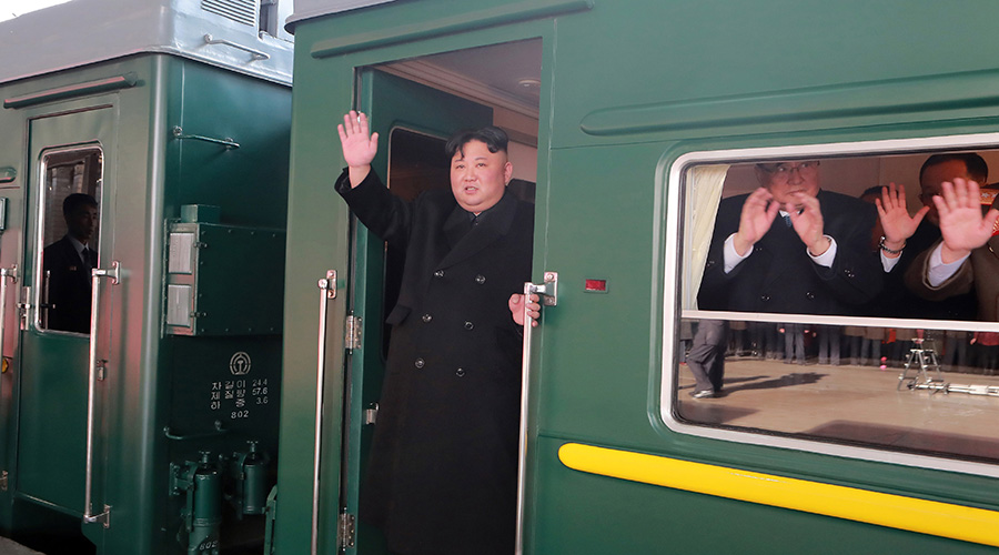 Kim Jong-un, top leader of the Democratic People's Republic of Korea, waves to senior officials who have come to see him off at Pyongyang Railway Station in Pyongyang. / Xinhua/KCNA