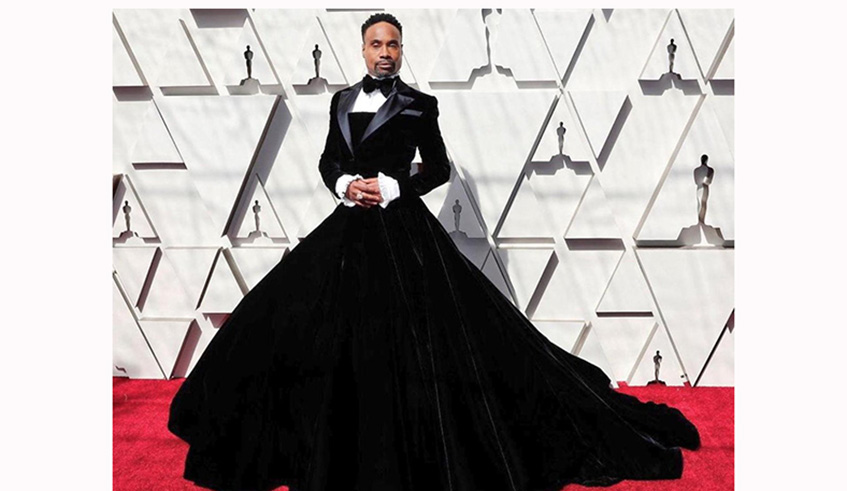 Broadway star Billy Porter, in a tuxedo-themed gown that's still provoking comments on social media, hours after it first made a splash on the red carpet. Net.