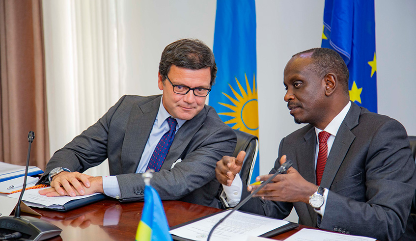 Minister for Foreign Affairs Dr Richard Sezibera chats with EU Ambassador to Rwanda Nicola Bellomo during the meeting in Kigali yesterday. Emmanuel Kwizera.