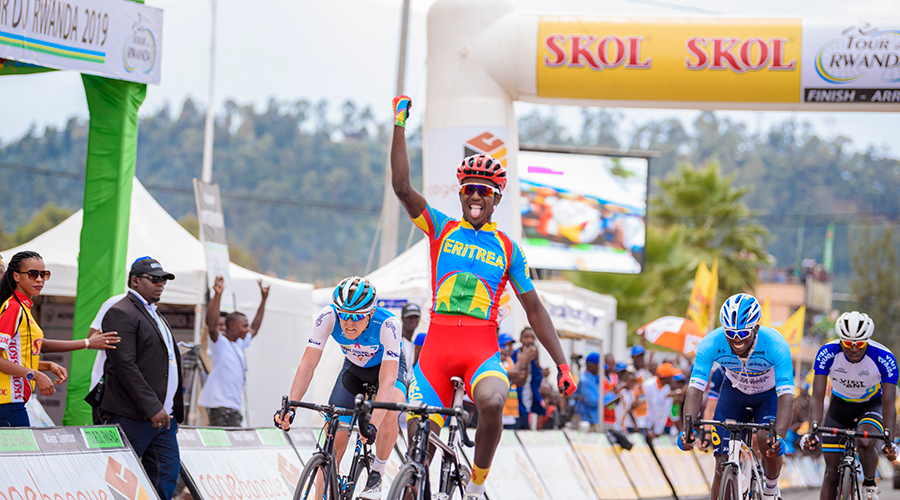 Girmay Biniam Hailu, 18, celebrates his Stage 5 victory after crossing the finish-line in Musanze on Thursday afternoon. / Plaisir Muzogeye