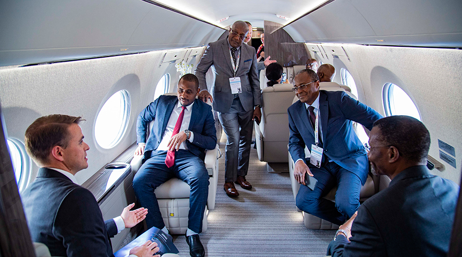 Officials experience the interior of the  latest model of Gulfstream business jet, which was showcased at the just concluded Africa Aviation Summit and Exhibition in Kigali. Rwanda is keen to upgrade the event to a continental Air Show, official said. / Emmanuel Kwizera