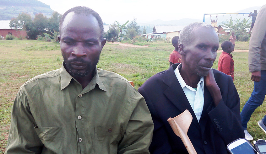 Sylvestre Rwasa (Left) sitting together with Jean Nepomscene Kayibanda. Marie Anne Dushimimana