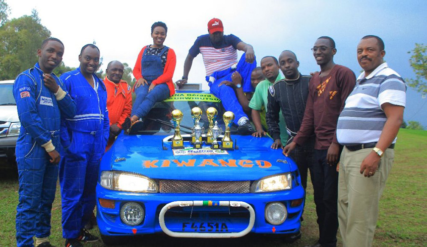 Rally drivers pose for a group photo with Enterprise Urwibutso owner Gerard SIna (R) after a practice race in Rulindo District last December. Courtesy