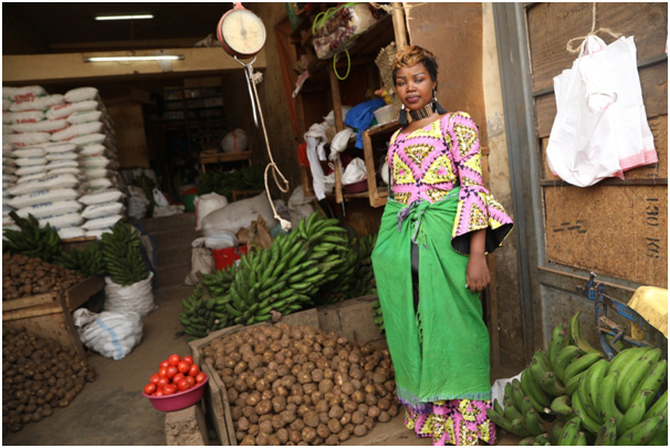 Mbishibishi Desange, pictured  is a Bank of Kigali (BK) client who is set to receive a Zamuka Mugore loan to inject into her banana selling business in Nyabugogo market, Kigali.