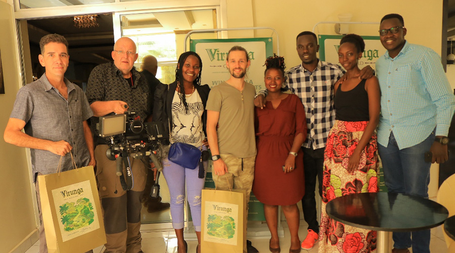 Some of the SKOL's staff and winner posing for photo at Kalisimbi hotel. / Michel Nkurunziza