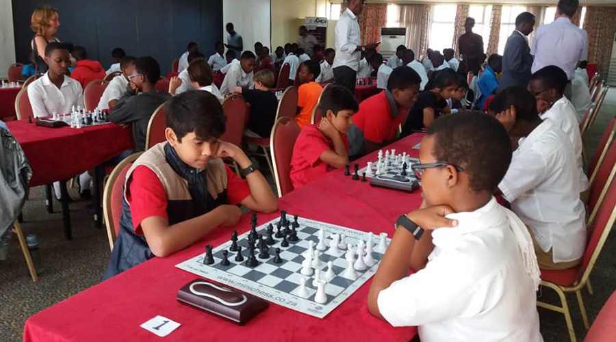 Green Hills Academyu2019s team (in red t-shirts) doing battle with one of the all-girls team from Lycu00e9e Notre Dame de Cu00eeteaux (LNDC).