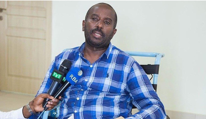 Fidele Gatsinzi, who was wrongly arrested in Uganda where he had gone to visit his son, speaks to journalists upon his arrival in Kigali, December 2017. Net photo
