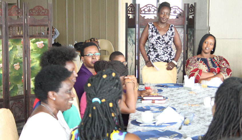Eva Gara(standing), the organiser of the event, during the discussion. Photos by Sharon Kantengwa