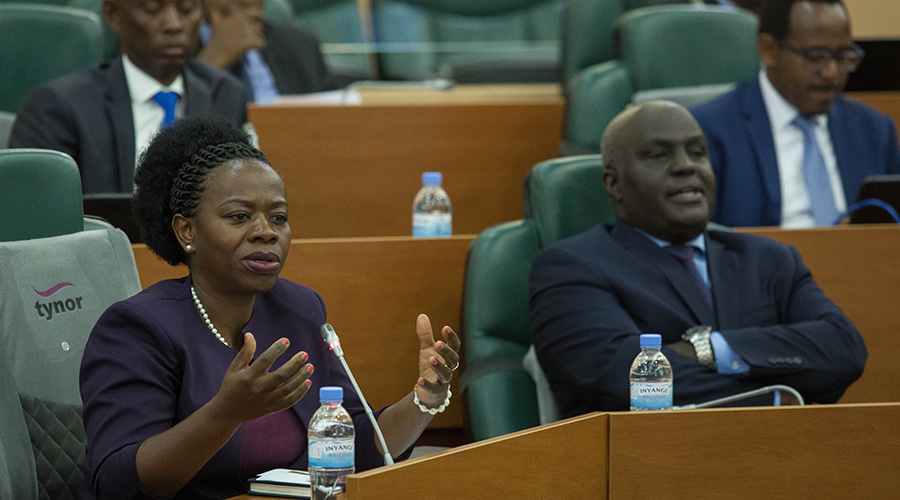 Monique Nsanzabaganwa, the central banku2019s Deputy Governor addresses members of the senatorial Committee on Economic Development and Finance on how the government is considering reducing interest rates under VUP at Parliament yesterday. / Nadege Imbabazi.