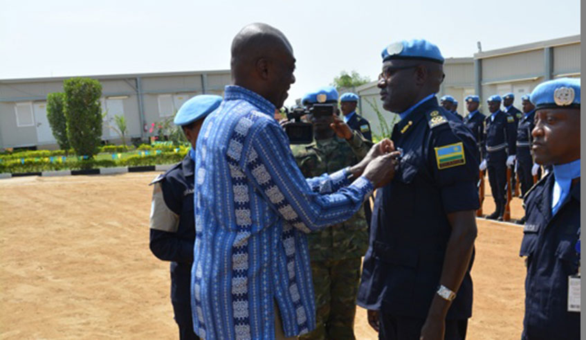 ACP Emmanuel Karasi is decorated with UN Service Medal of Honor in Juba on Thursday. He leads the contingent that has been deployed to South Sudan since April last year. Courtesy.