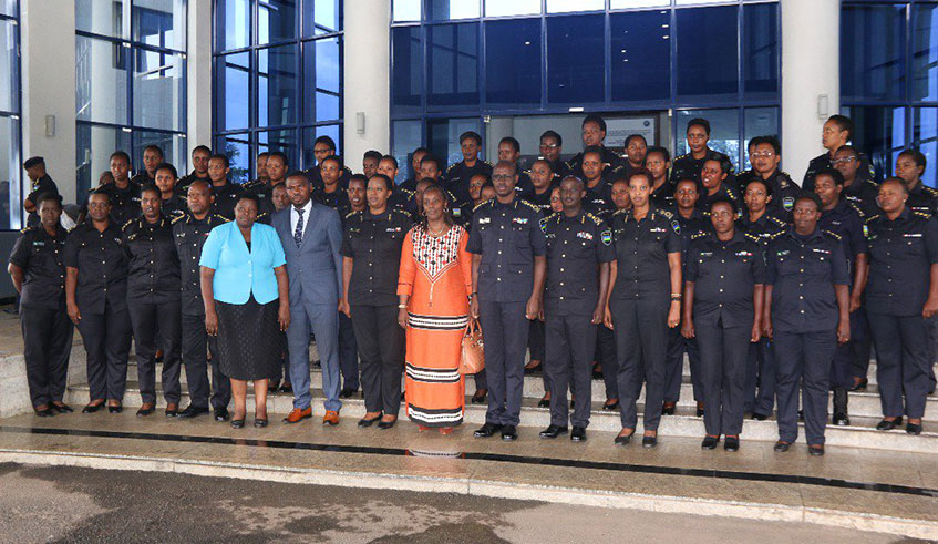 Minister Gashumba and other officials in a group photo with senior police officers and female members of the Force who attended the event yesterday. Courtesy.